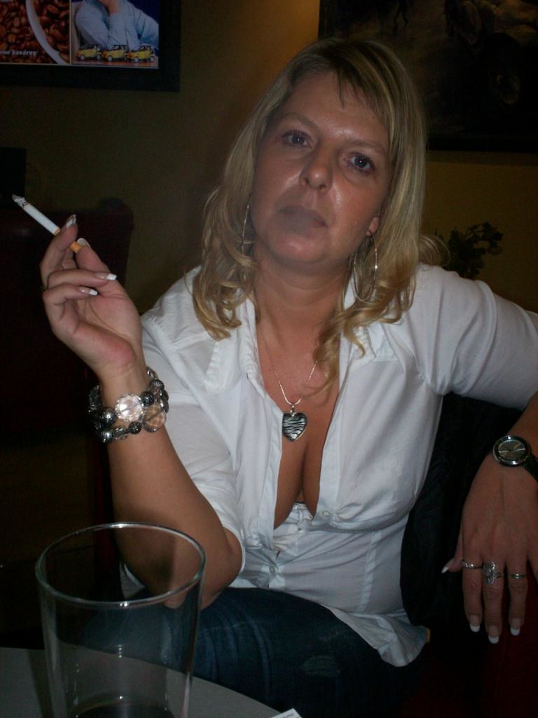 Smoking mature blonde