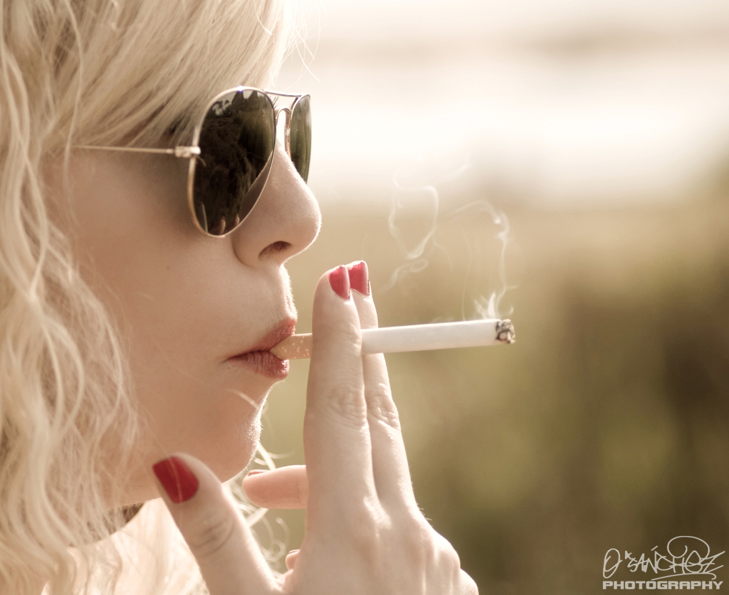 Smoking cutie with glasses fan pic