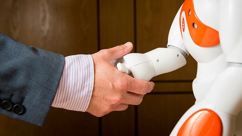 Handshake with robot.