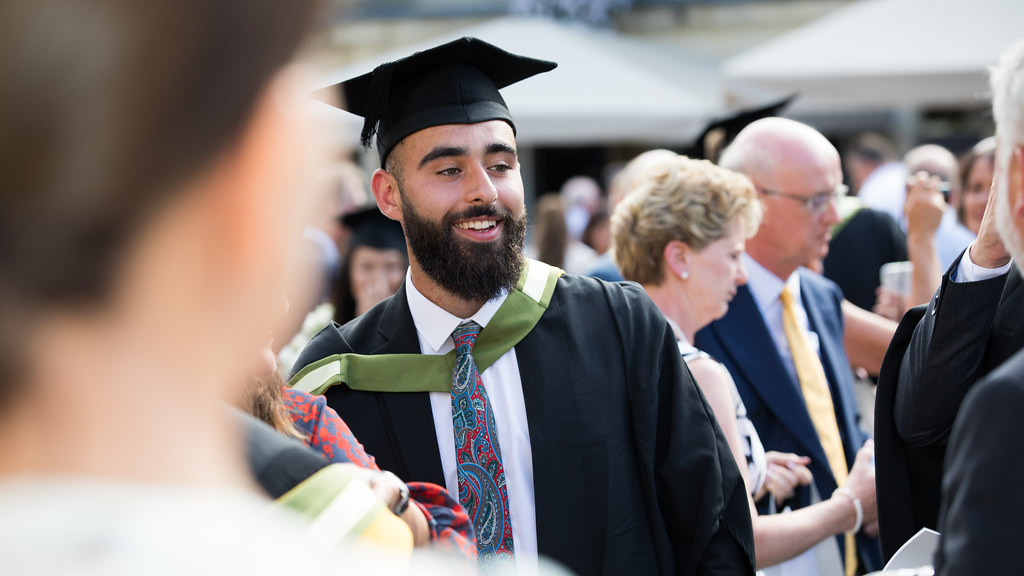 A student in graduation gown and cap