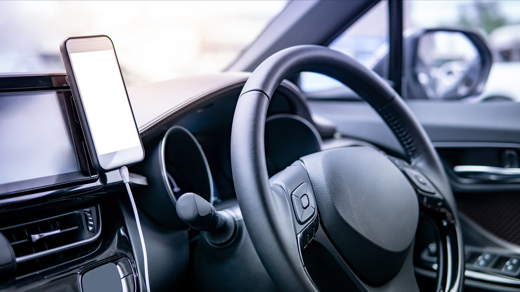 GPS and steering wheel in car