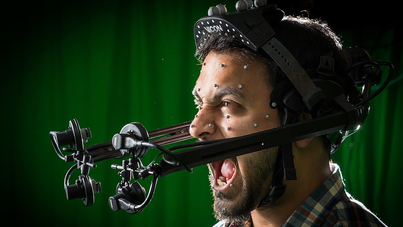 man wearing motion capture system on face