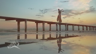 Beautiful woman at sunset in slow motion