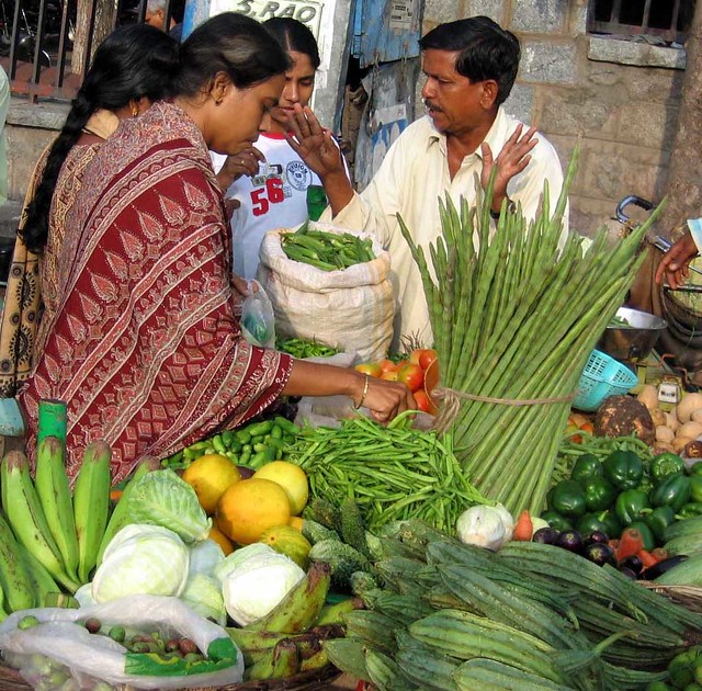Ladies Buying Vegetables