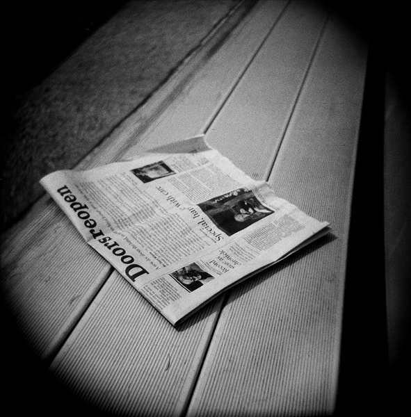 newspaper on the bench by gomgomi60