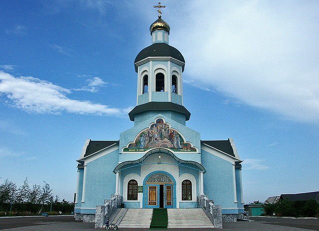 blue church under a blue sky