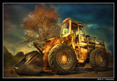 Abandoned Tractor by Eric Rousset