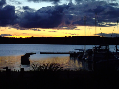 sunset reflection water clouds bay dock michigan f10 lakemichigan greatlakes traversecity joeldinda grandtraverse bowersharbor