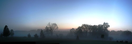 Mists across the street by mightyboybrian, I love how the mists across the street come out at sunset sometimes. Here's a lovely panoramic.canon