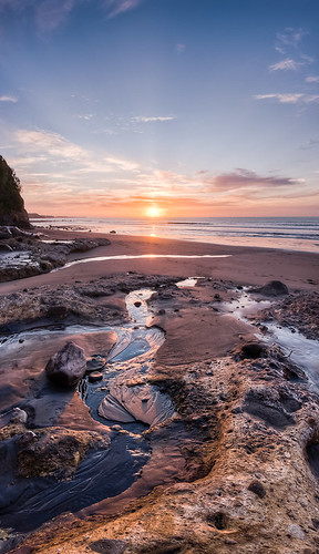sunset sea newzealand panorama cloud beach water stone flow sand nikon rocks stream rocky taranaki rockpool newplymouth trickle backbeach d90 sigma1020 nikond90 vertorama