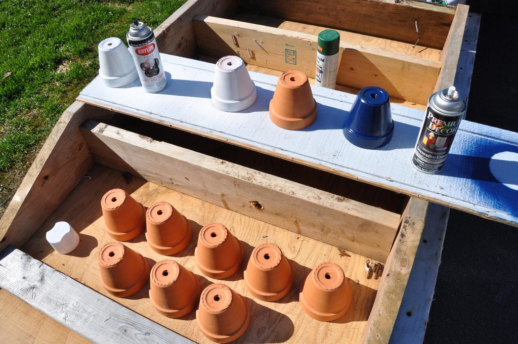 Spray painting terracotta pots