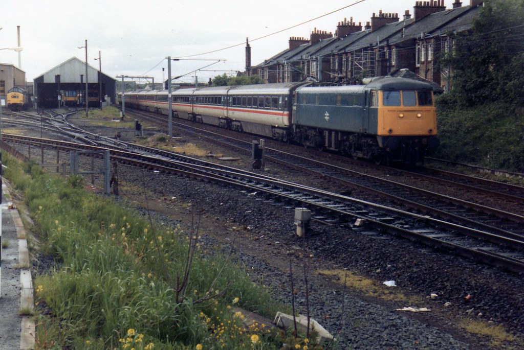 Ayr: 85022 passing depot with 0845 Ayr - London Euston 04-06-1988