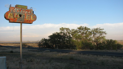 A great old motel sign at sunset by Great Beyond, A fantastic looking sign in the middle of nowhere from a motel long since gone.road old trip sunset