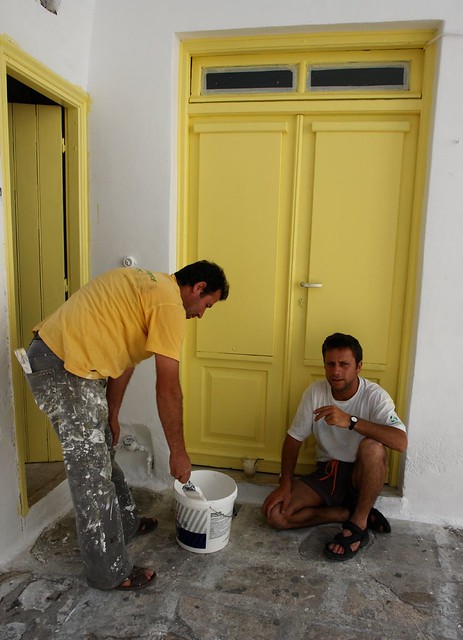 Mykonos men and yellow door