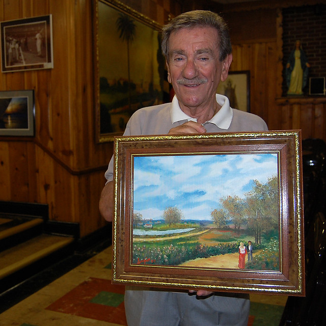 Sergio and one of his paintings