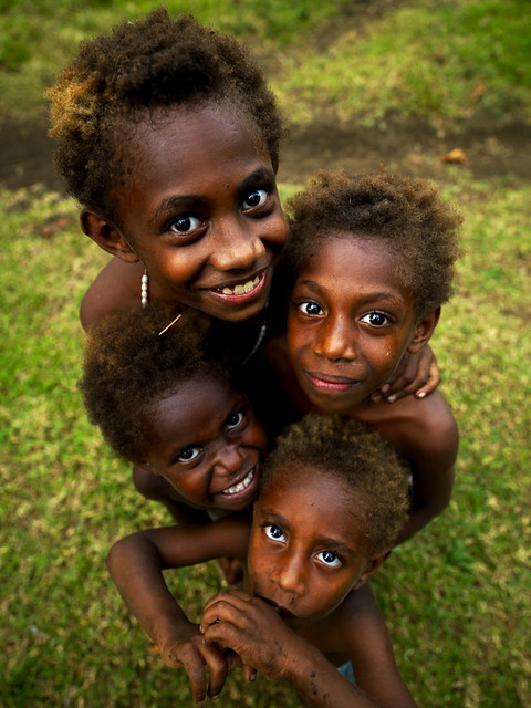 Group of smiling Ni-Vanuatu children seen from above, Malampa Province, Malekula Island, Vanuatu