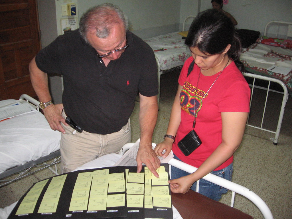 Dr. Jorge Palacios And A Resident Setting The Schedule