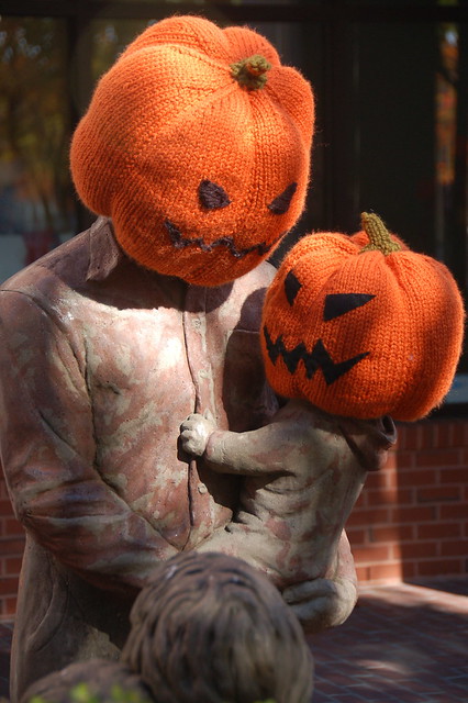 Jack O'Lantern parent & child with another family at Statue Park, Davis Square, Somerville