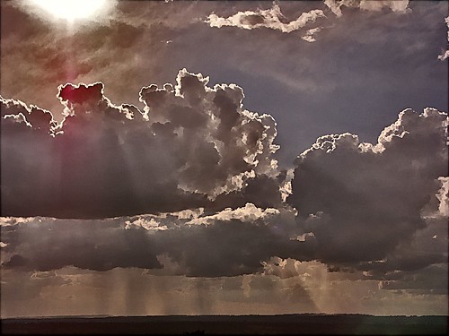 Clouds, Sunbeams and Rain by algo