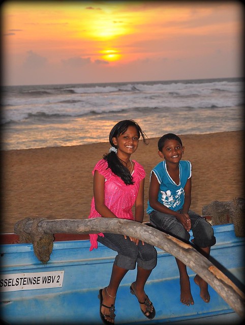 Smiling as the sun sets at Wadduwa Beach, Sri Lanka.