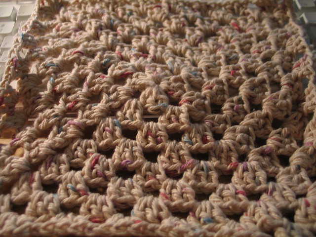 still another crocheted cloth