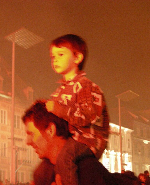 On his father's shoulders III