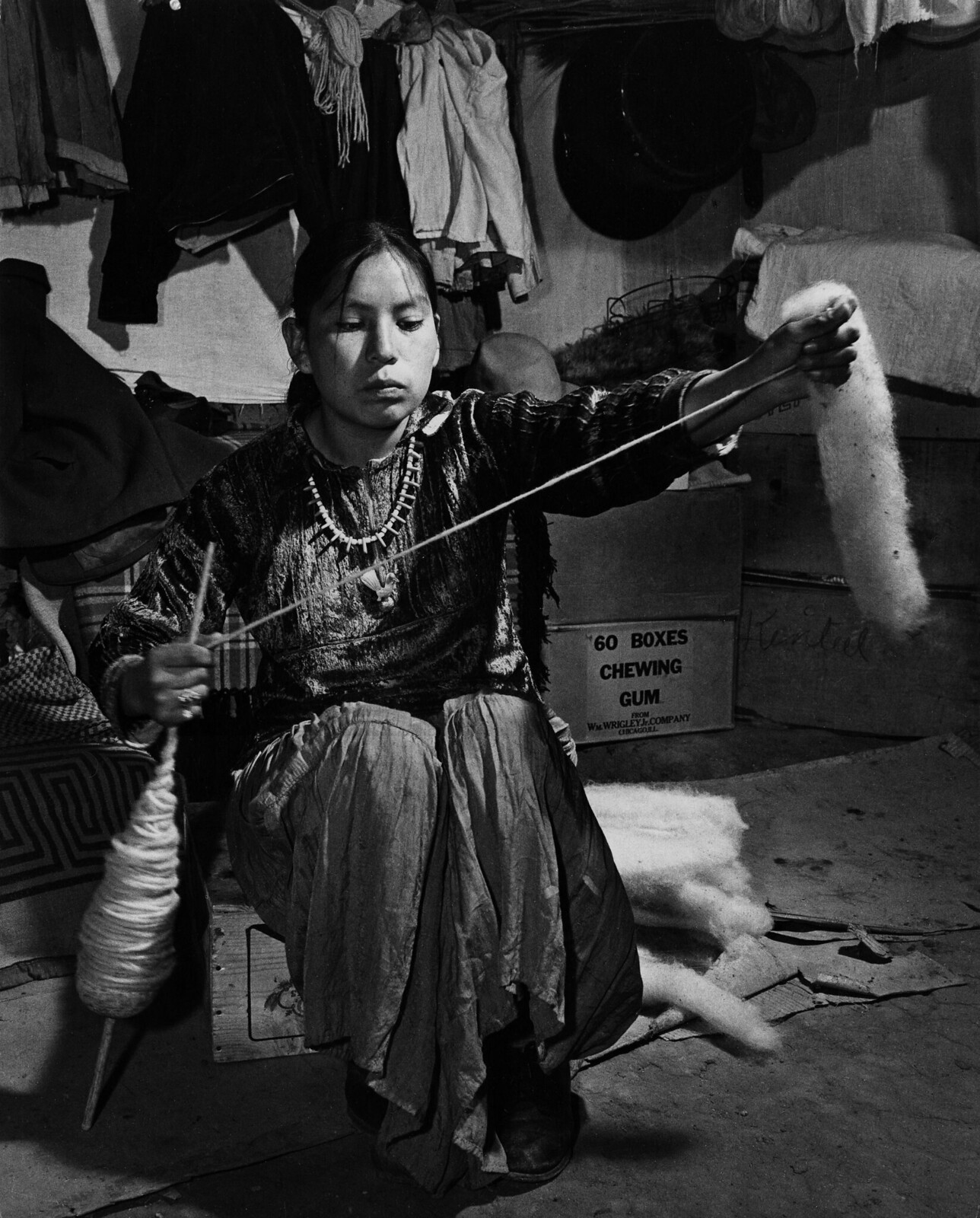 Navajo girl handspinning