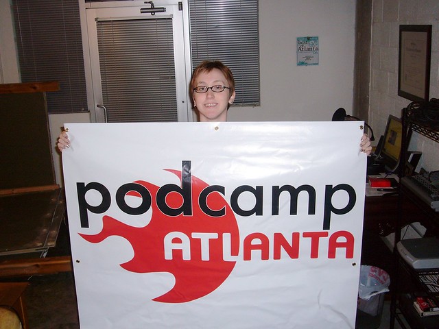 Me with the PodCamp Atlanta banner