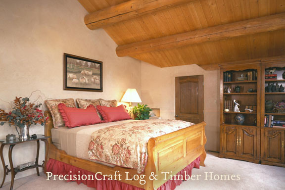 Post & Beam Handcrafted Log Home Bedroom | Home located in Sun Valley, Idaho | by PrecisionCraft Log Homes & Timber Homes