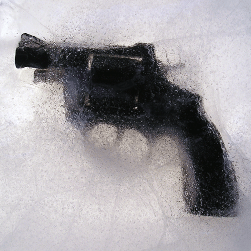 Toy Gun Frozen In Ice