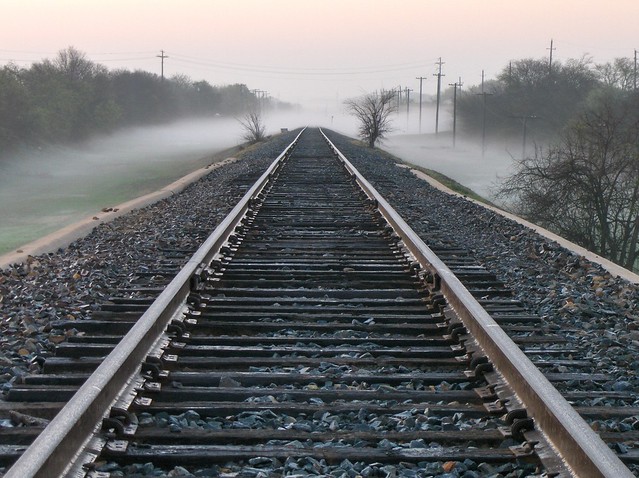 Foggy railroad tracks