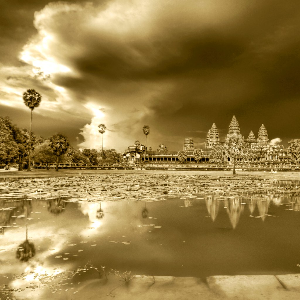 Evening Night Bathing Angkor Wat under Impending Storm by Trey Ratcliff