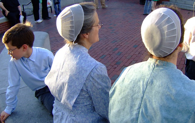 Mennonite women and child at their songfest in Harvard Square