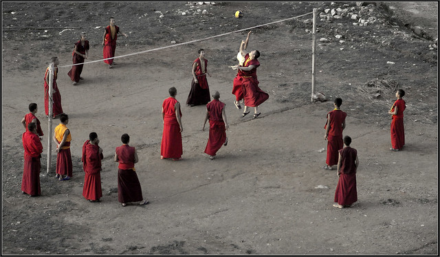 Monks playing Volley ball in the afternoon