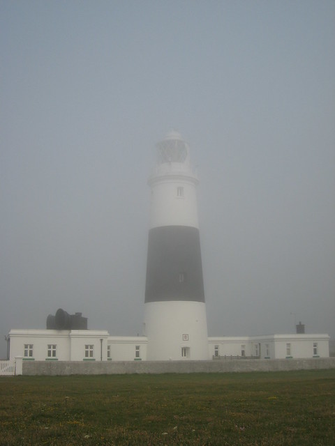Alderney Lighthouse in the fog