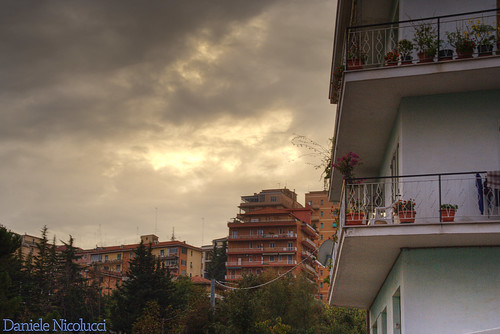 flowers sunset sky sun clouds buildings landscape balcony condo vegetation vase hdr chieti
