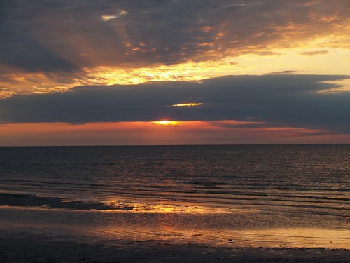 sunset sky lake beach water clouds calm redsky sunbeam