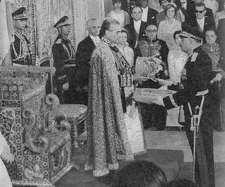 In these two pictures, the moment the Shah of Iran places the Pahlavi Imperial Crown on his head, while an officer carrying the Imperial Sceptre on a cushion approaches (below).