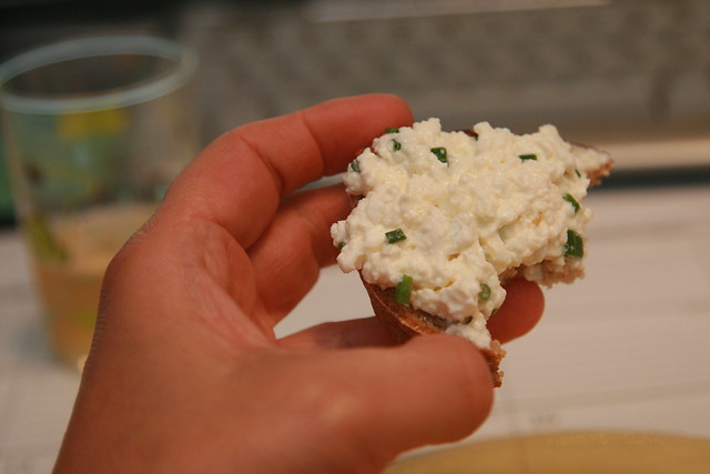 Homemade RAW cream cheese (local grass-fed Jersey cow milk) with chives from the garden on homemade whole grain bread with a glass of kombucha