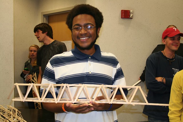 Our Proud Winner! This bridge held 69 pounds!
