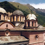 The monastery is trapped between a collection of mountains