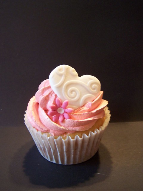 pink swirl white heart cupcake