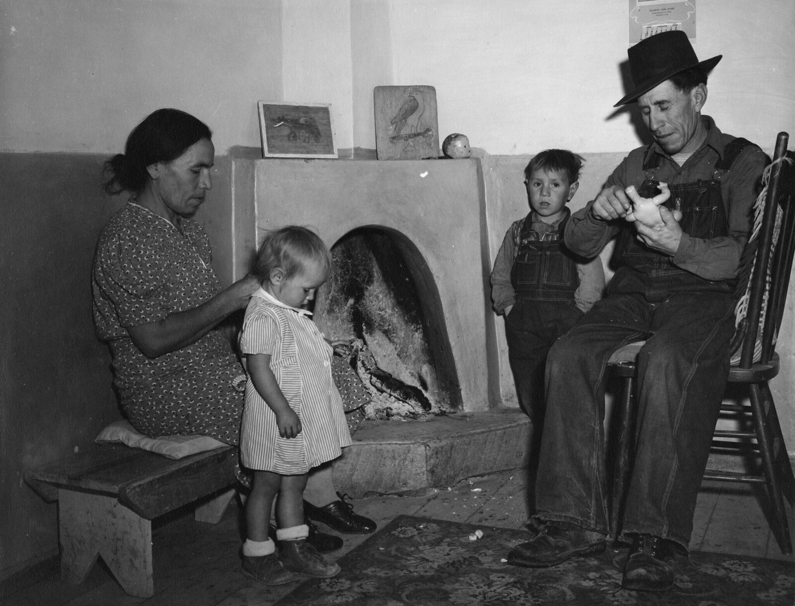 Lopez family around the kiva fireplace