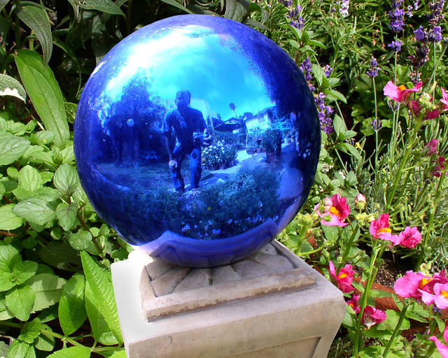 Self-portrait in blue gazing ball
