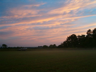 Sunset over neighbors' field