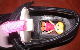 clarks shoes with doll inside