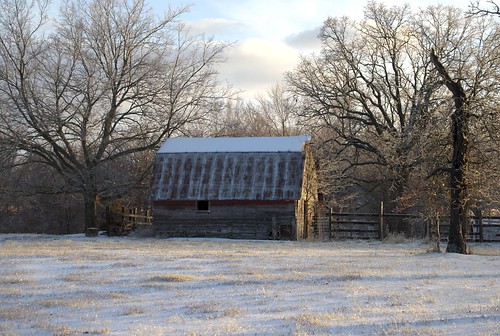 old trees sky snow ice grass clouds barn