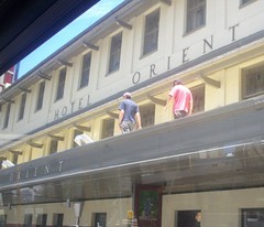 2 guys on the balcony of the Orient Hotel -  070108 bus ride through Spring Hill, City, Fortitude Valley and New Farm