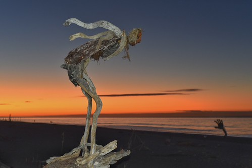 Diving in at Hokitika by Myreality2, Each year Hokitika hosts the Driftwood and Sand Festival. Participants make sculptures from things t