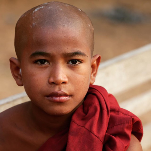 Captured in December 2015, portrait of a young Buddhist student, Bagan, Myanmar. #student #Buddhist #buddhism #buddha #monk #bagan #myanmar #igersmyanmar #asia #red #cntraveler #voyageursdumonde #wanderlust #travel #traveller #travelgram #travelingram #in